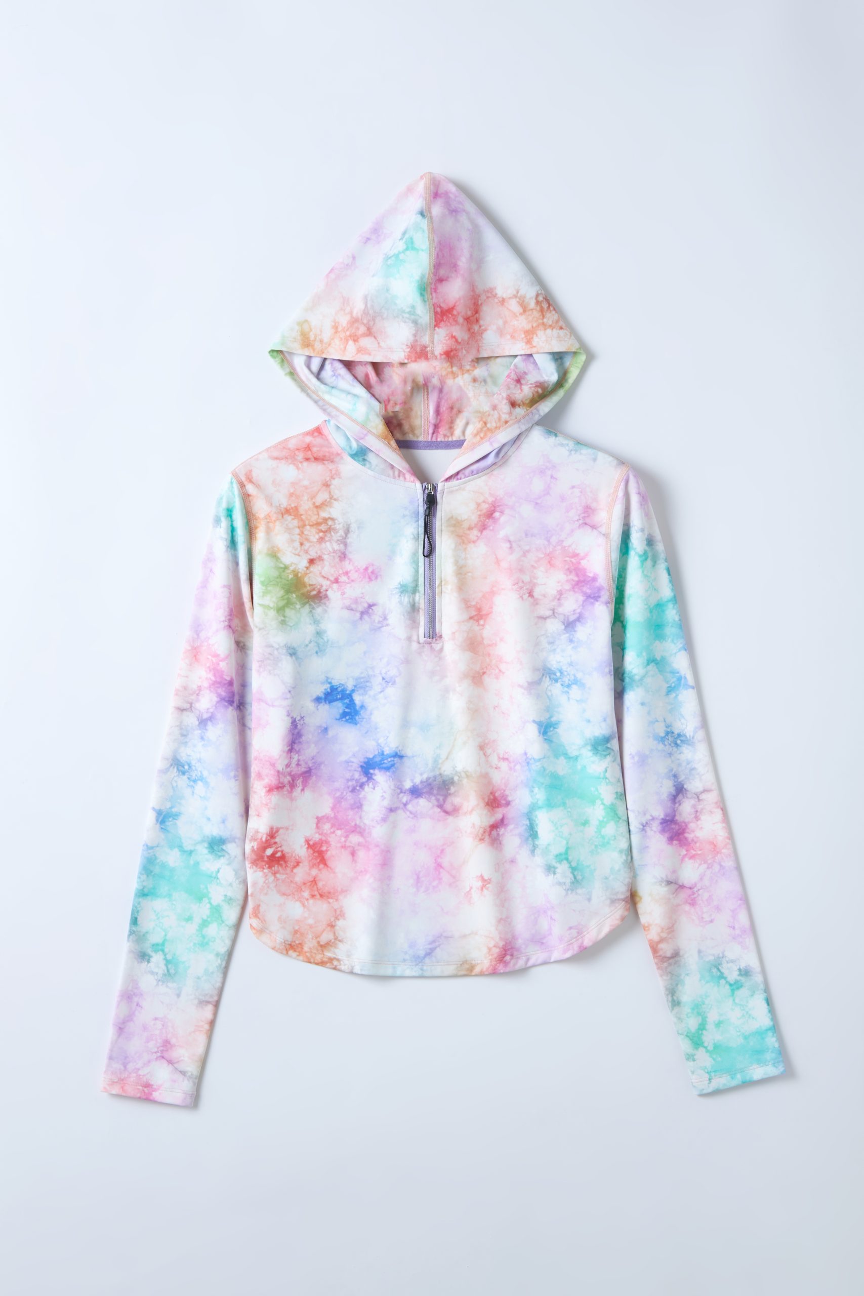 Side-by-side lab testing of yoga tops under studio lighting