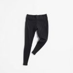 High-waisted black seamless leggings in charcoal on a white studio background.