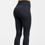 Charcoal ribbed flare leggings, high waisted gym leggings on white background, hyperrealistic 8k product photo.