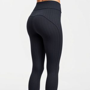 Charcoal ribbed flare leggings, high waisted gym leggings on white background, hyperrealistic 8k product photo.