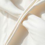 Close-up of the eco conscious bamboo wrap top showing its soft Egyptian Cotton texture and quality stitching.