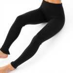Black best flare leggings for yoga, studio shot on a white background.