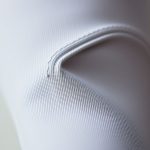 Close-up of Pima Cotton fabric texture and stitching on flare leggings petite, workout leggings with pockets.