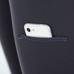 Close-up of Pima Cotton fabric in flare leggings woman tights with phone pocket, highlighting texture and stitching.