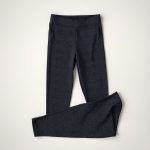 Flat lay of charcoal patterned yoga pants from Cloths Shops, neatly folded on a neutral surface.