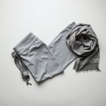 Heather Grey petite yoga pants with Arabian scarf print, neatly folded in a flat lay.