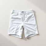 White warrior 111 Christmas bike shorts neatly folded in a minimalist flat lay on a neutral background.