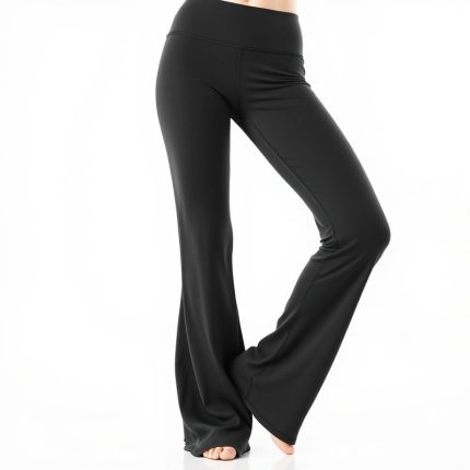 Charcoal organic activewear yoga flared pants on a clean white studio background.