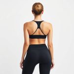 Back view of charcoal yoga pants on off, eco friendly Australian activewear on a model.